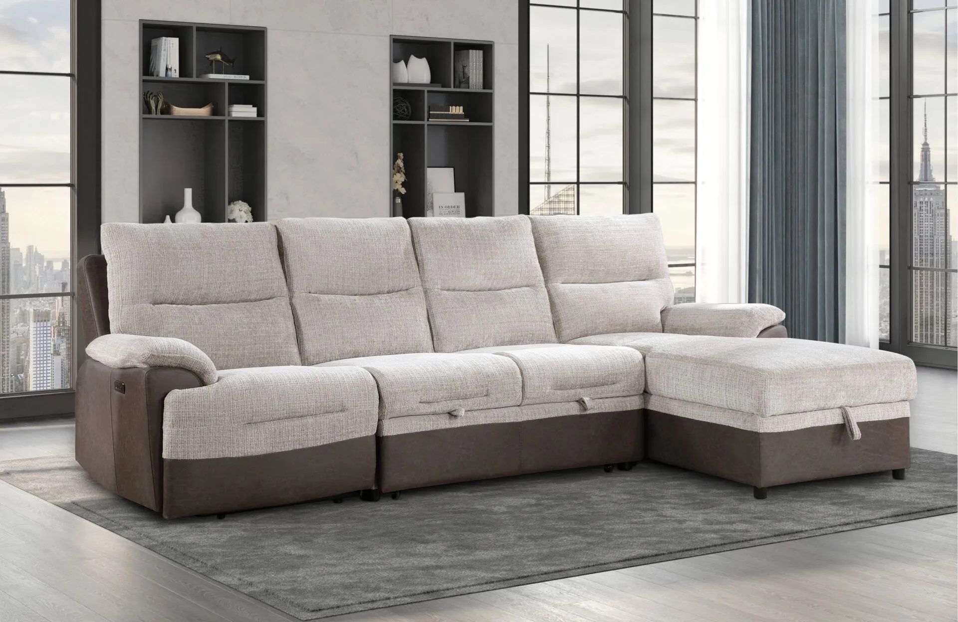 A large sectional couch is sitting on top of a rug in a living room.