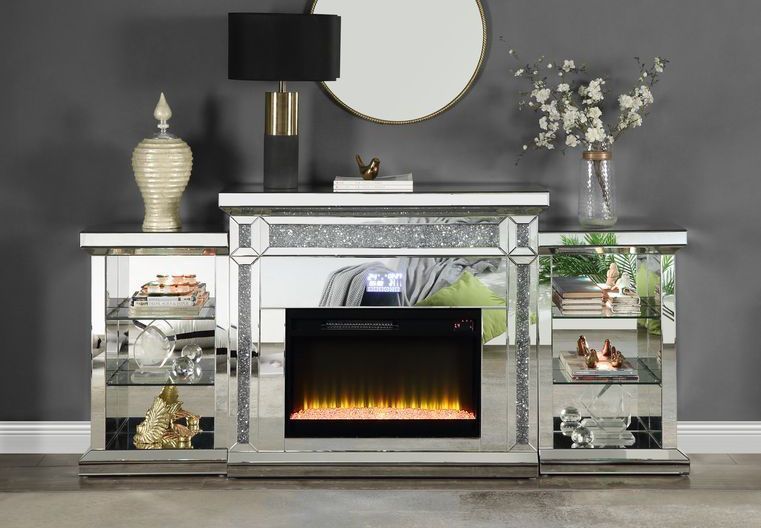 A living room with a fireplace and a mirror