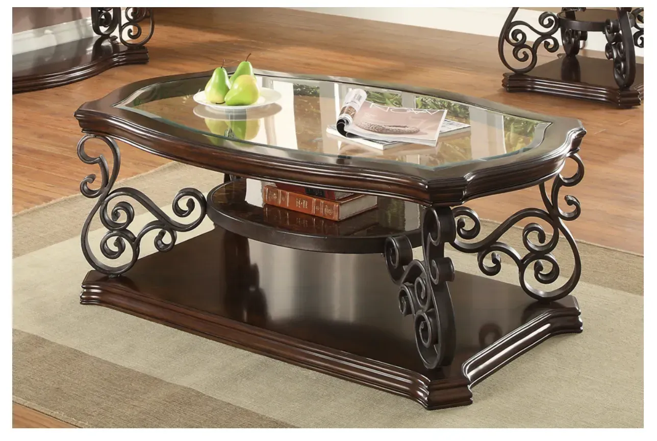 A coffee table with a glass top and a book on it