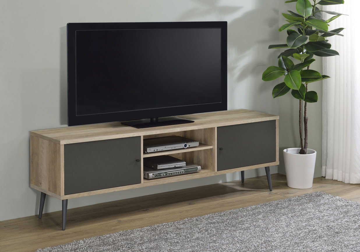 A flat screen tv is sitting on top of a wooden entertainment center in a living room.