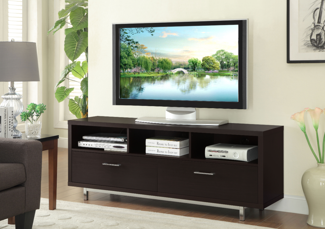 A living room with a flat screen tv on a stand