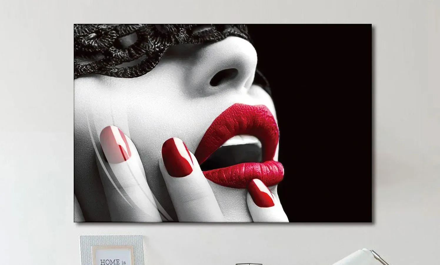 A black and white painting of a woman with red lipstick and red nails.