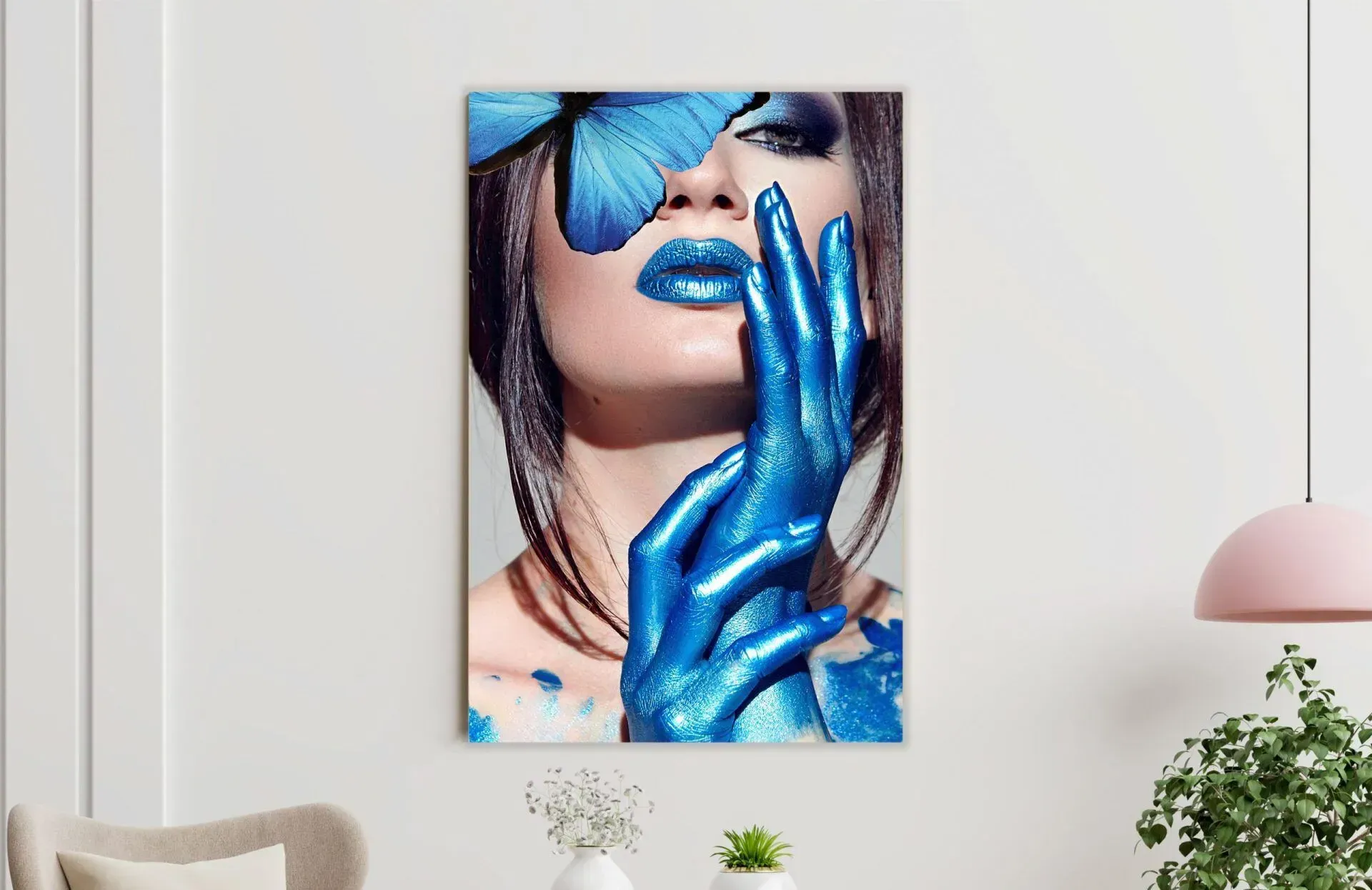 A painting of a woman with blue gloves and a butterfly on her face.
