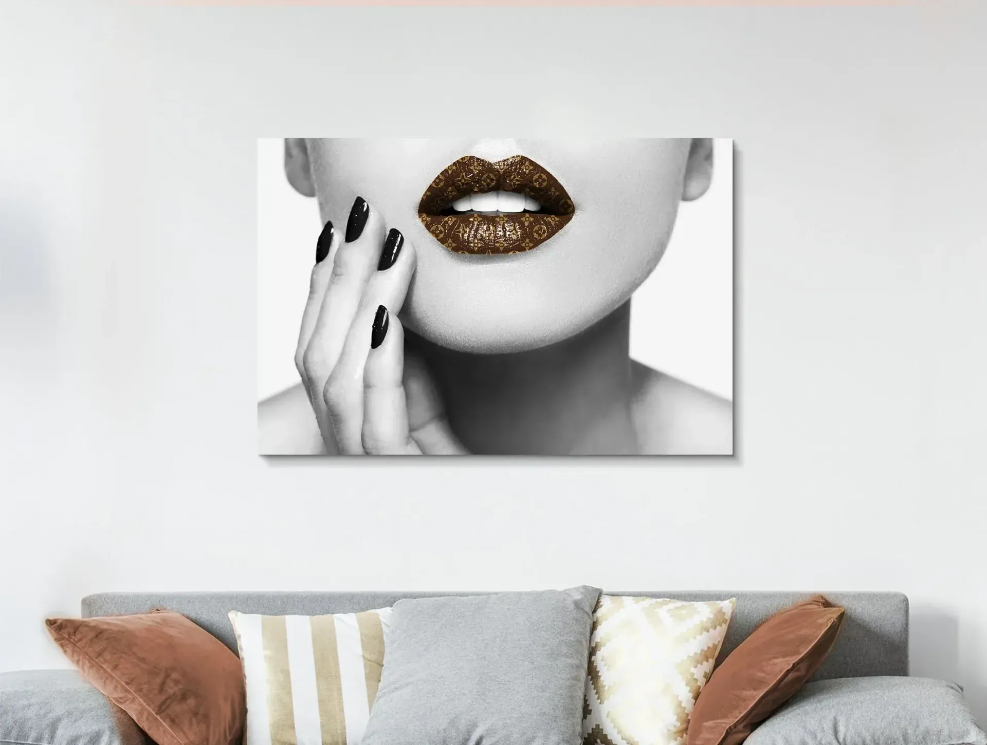 A black and white photo of a woman 's lips and nails