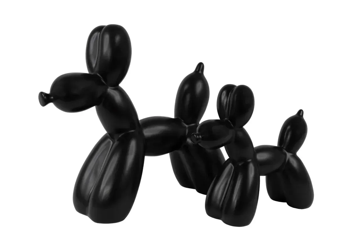 Three black balloon dogs on a white background