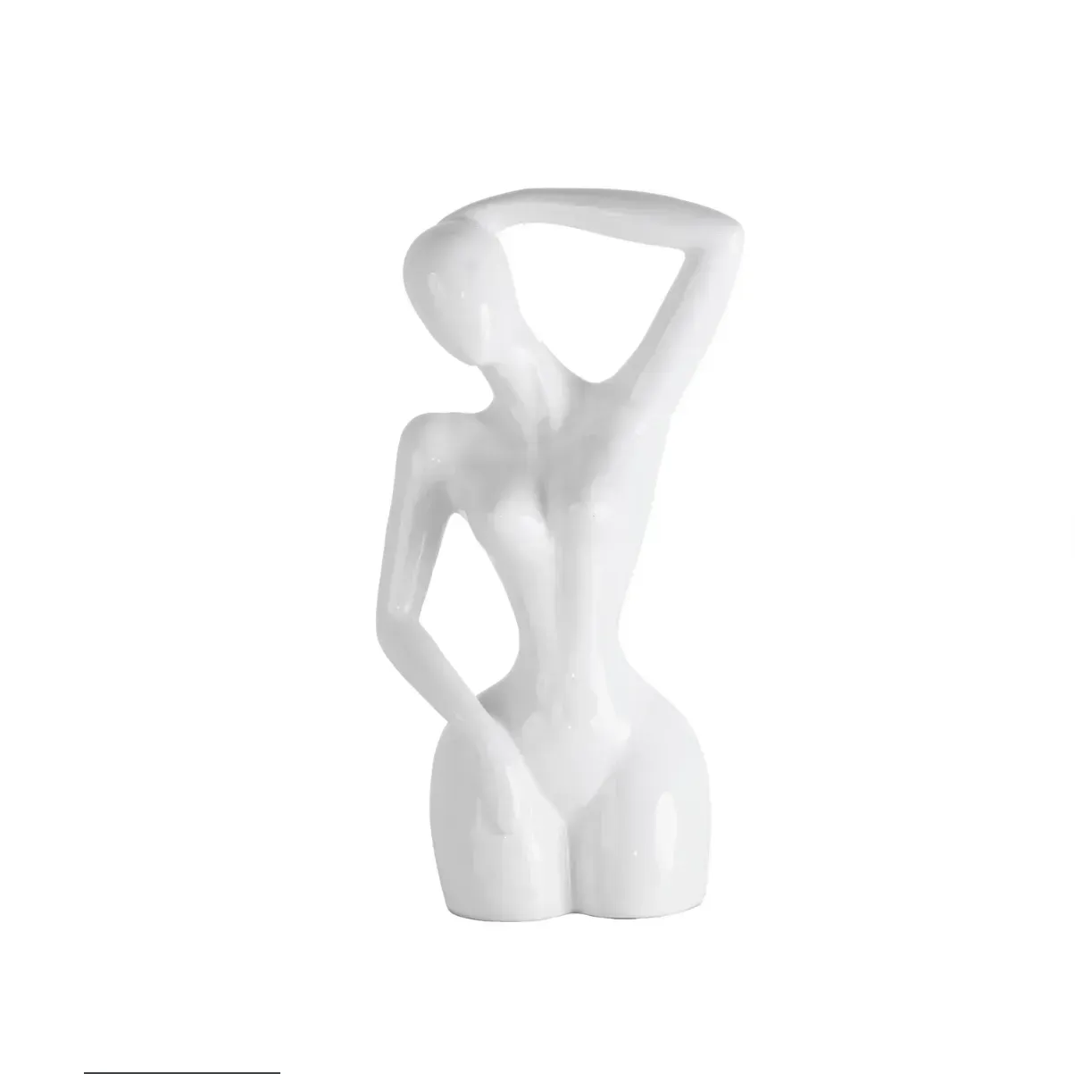 A white statue of a woman with her hand on her head.