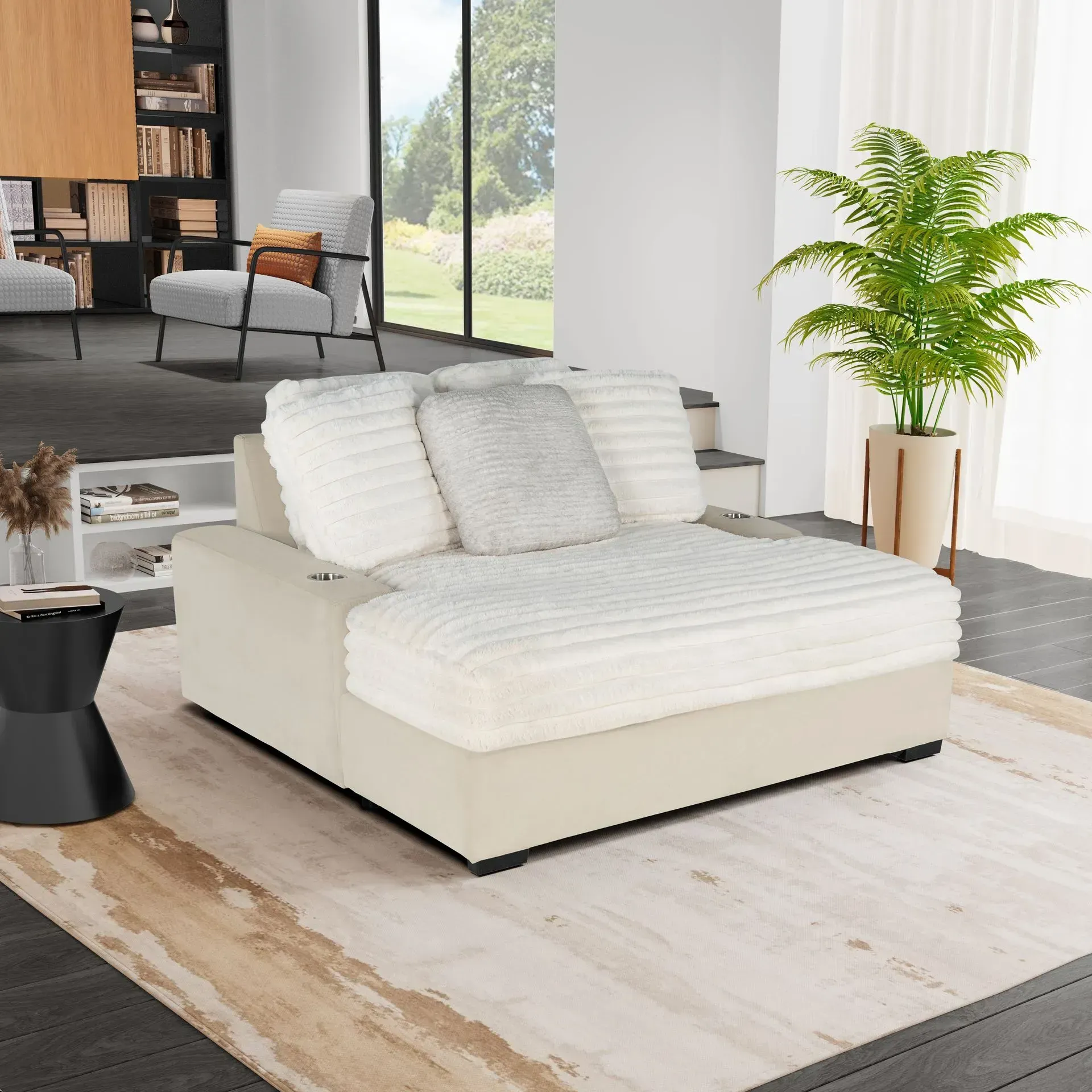 A large white couch is sitting on a rug in a living room