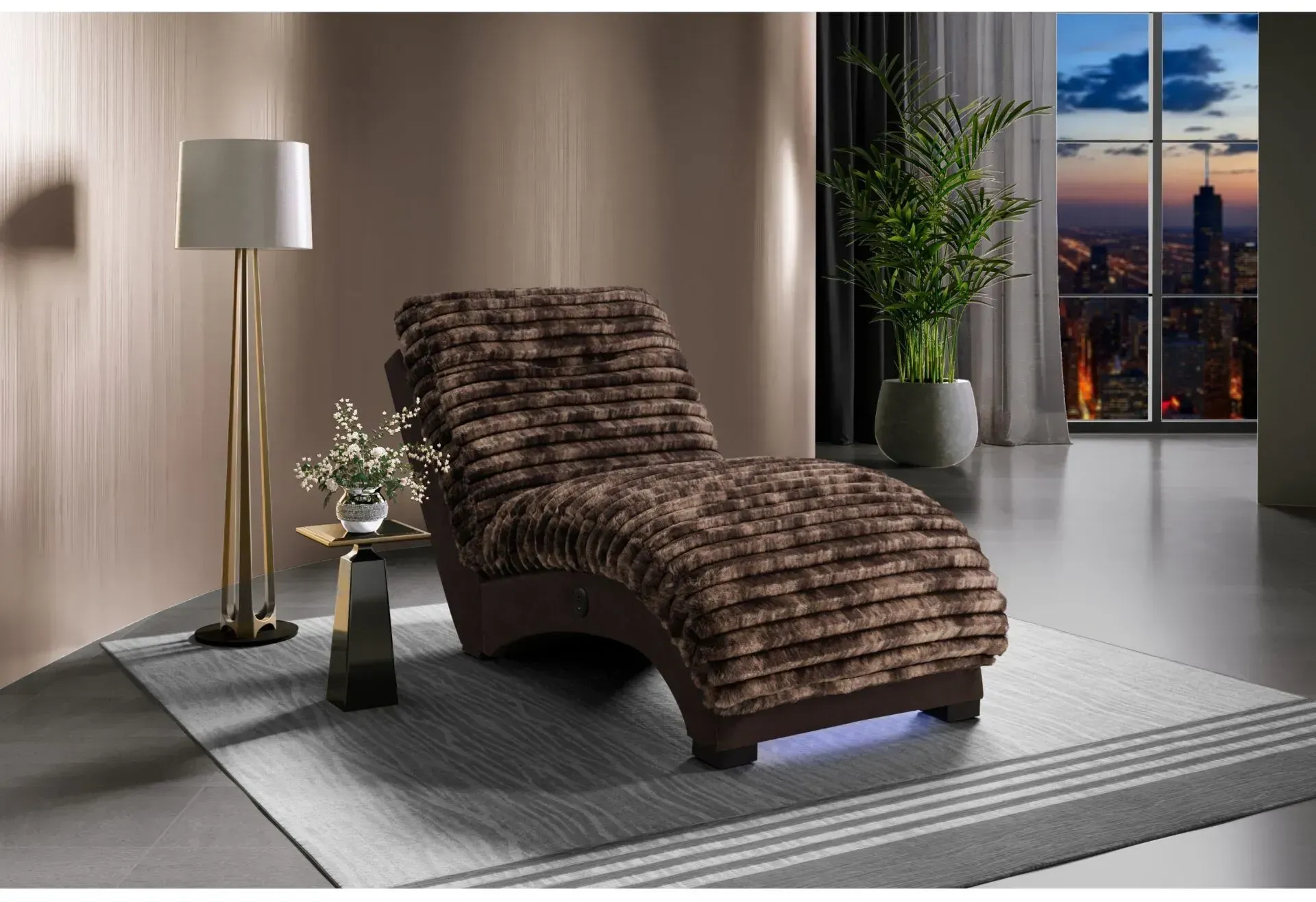 A brown chaise lounge is sitting on a rug in a living room next to a lamp.