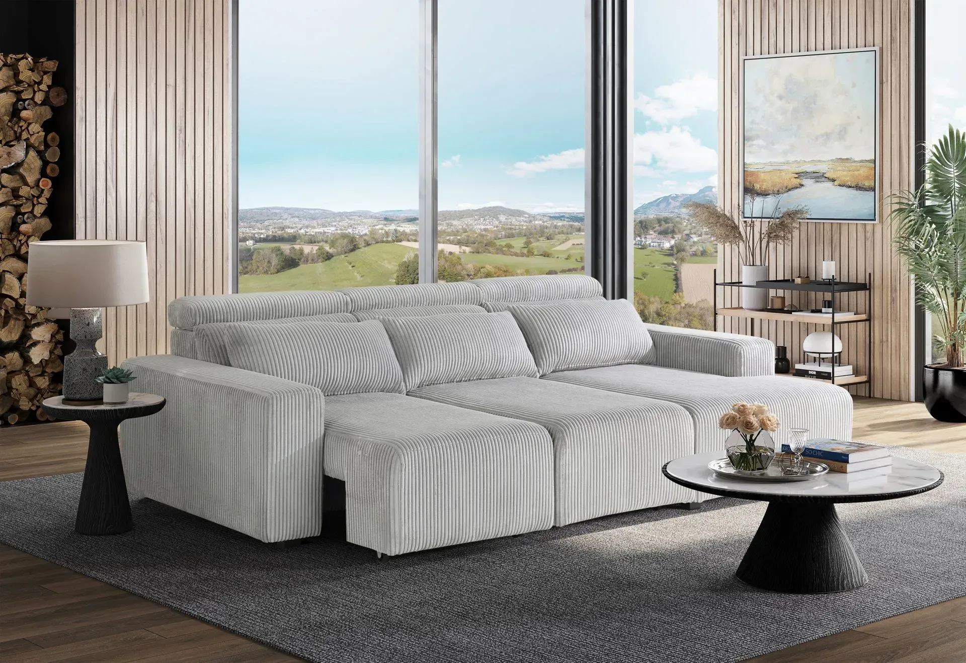 A living room with a white couch and a coffee table.