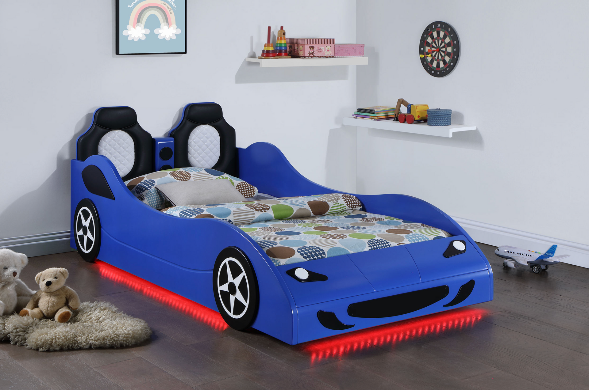 A blue car bed in a child 's room