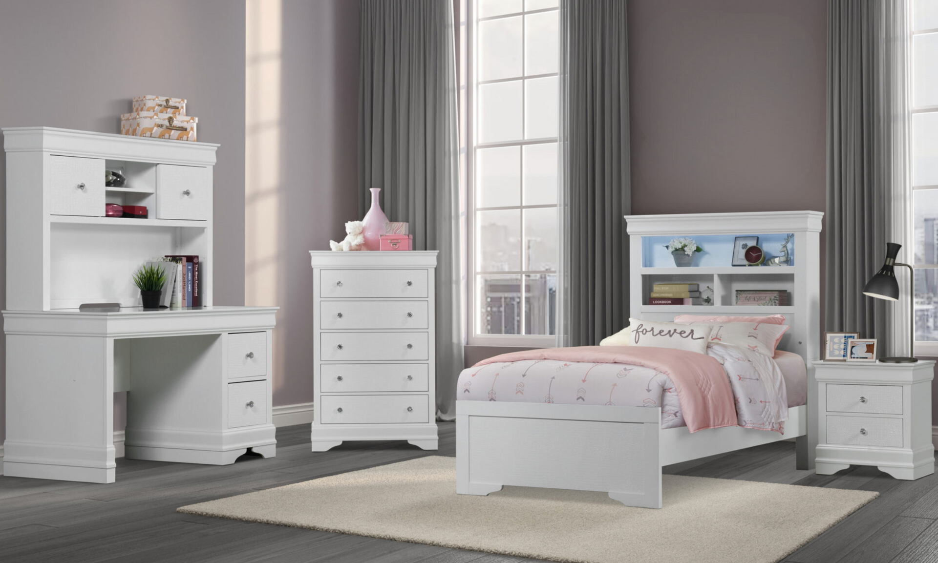 A bedroom with a bed , desk , dresser , nightstand and rug.