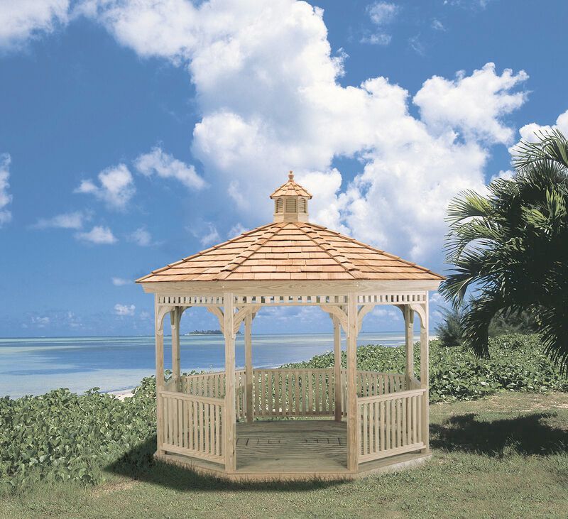 A wooden gazebo with a roof overlooking a body of water