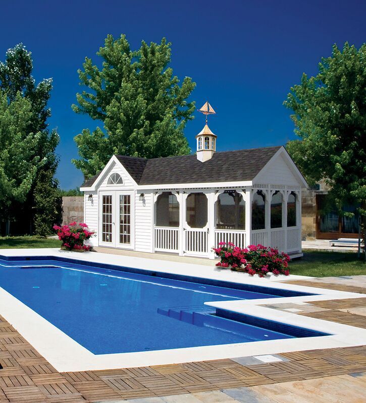 A white gazebo sits next to a large swimming pool