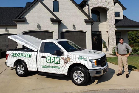 GPM Termite & Pest Solutions owner with his service vehicle