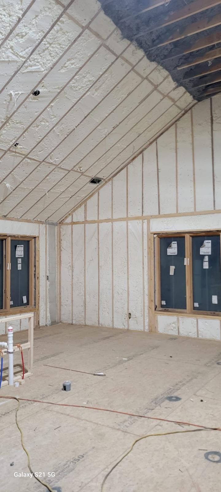 A room with a lot of insulation on the walls and ceiling.