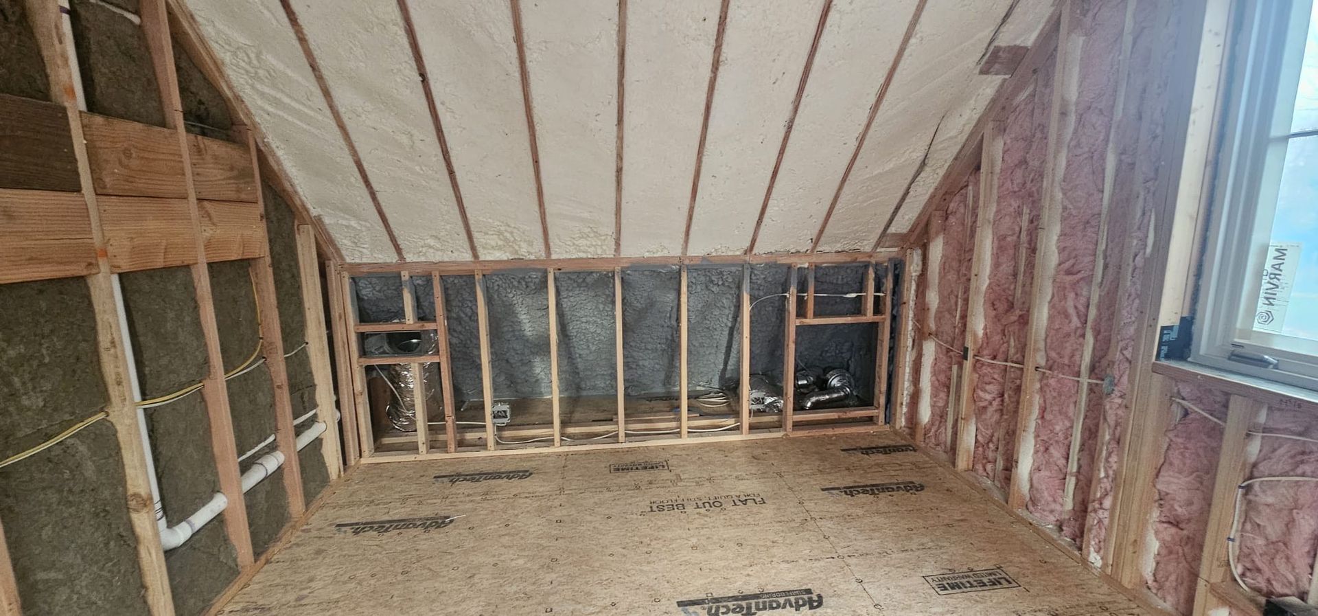 A room with a ceiling that is being built in a house.