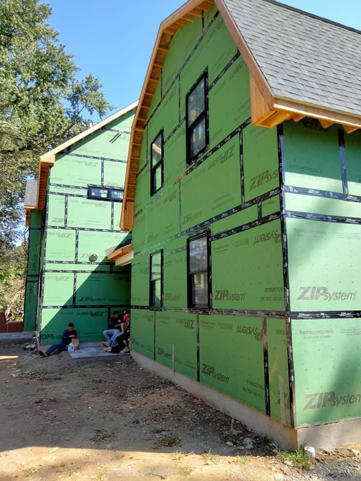 A house that is being built with green insulation