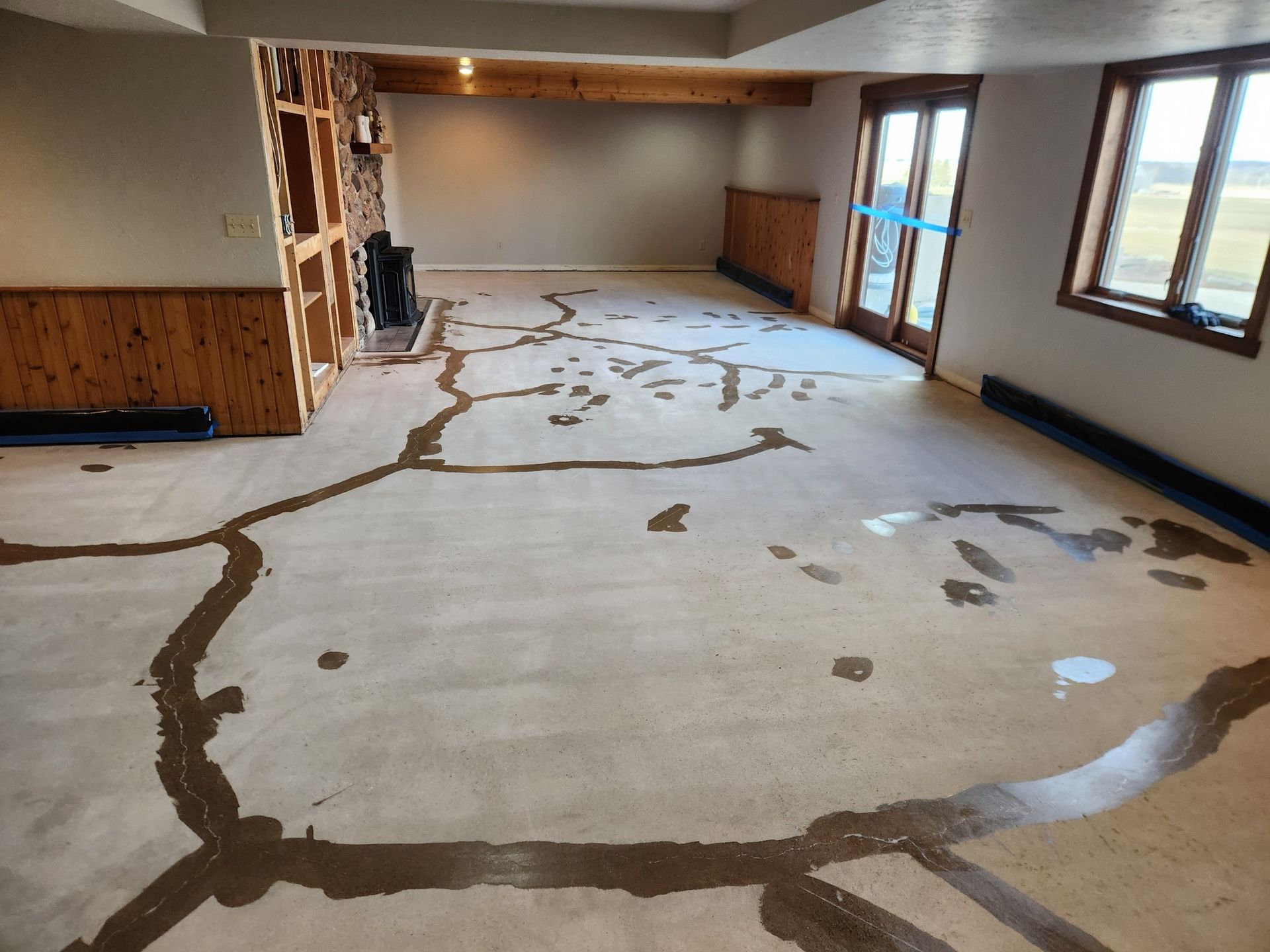 A large room with a map on the floor