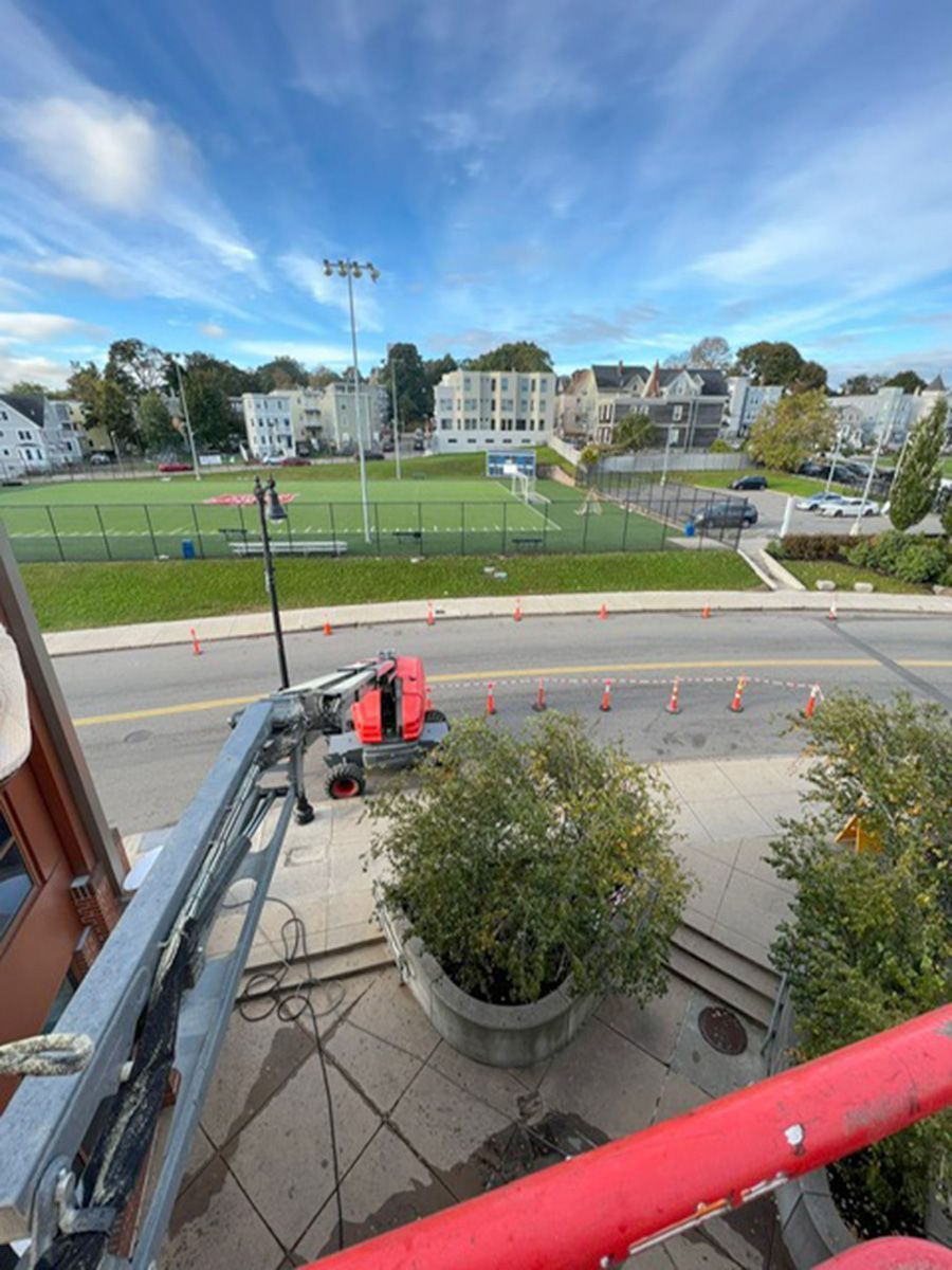 A view of a city from the top of a building