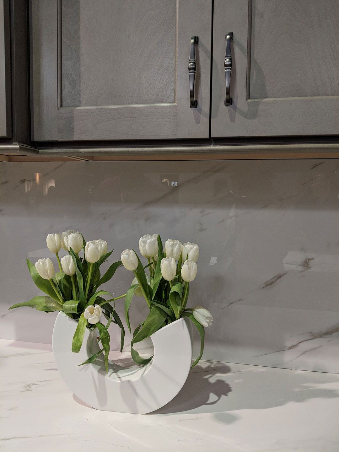 kitchen counter with flower vase