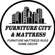 Logo for Furniture City & Mattress featuring a cityscape and text.