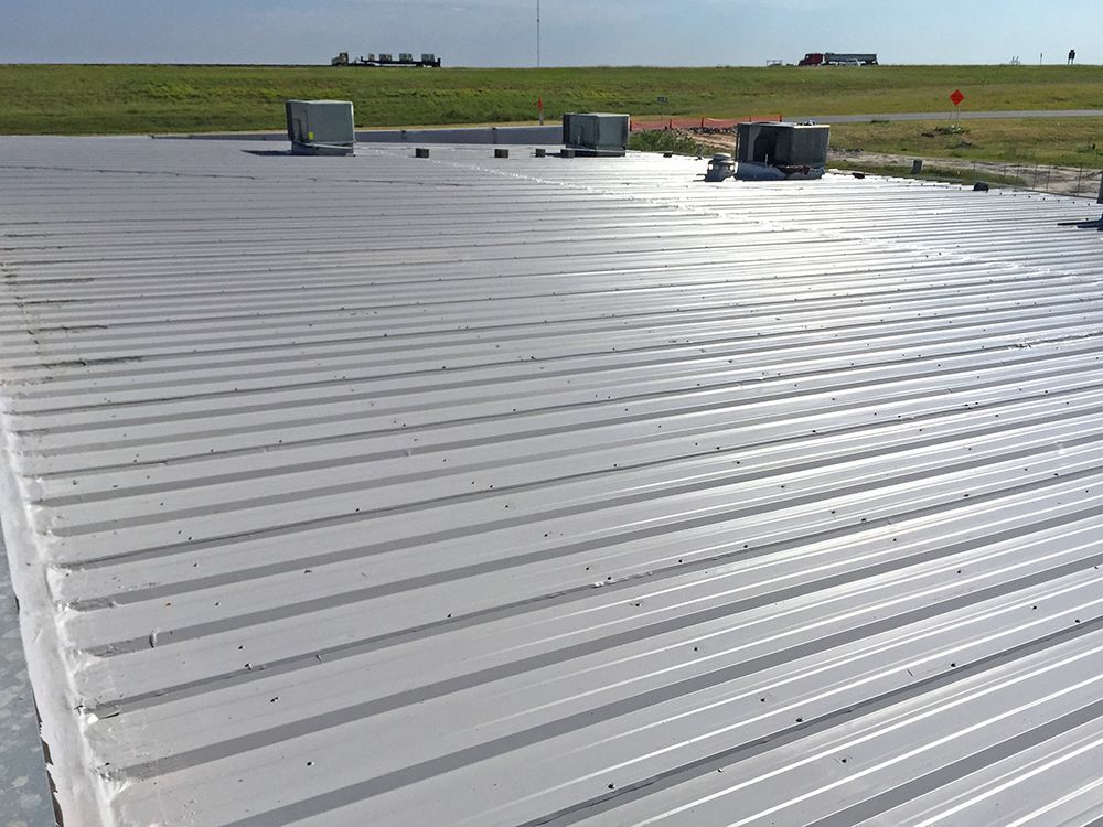 A white roof with a lot of lines on it