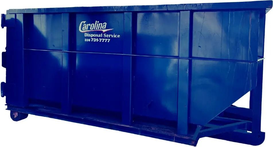 A blue dumpster with the word carolina on it.