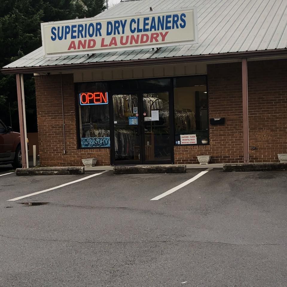 A brick building with a sign that reads 