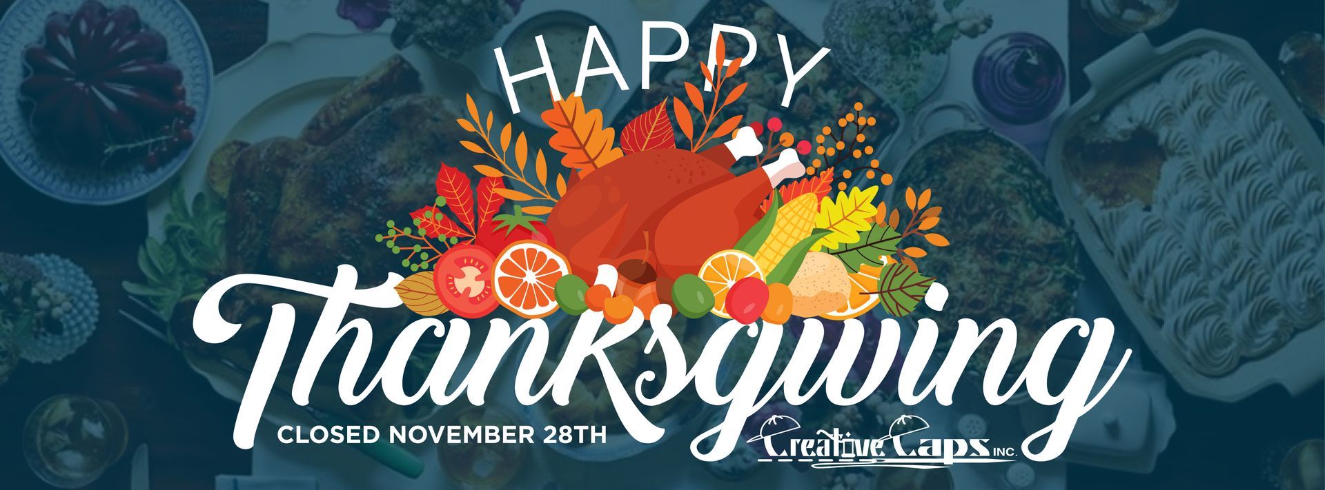 A Happy Thanksgiving banner with a turkey, fruits, and vegetables.