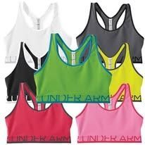A grid of six Under Armour sports bras in white, black, gray, lime green, bright yellow, red, and pink.