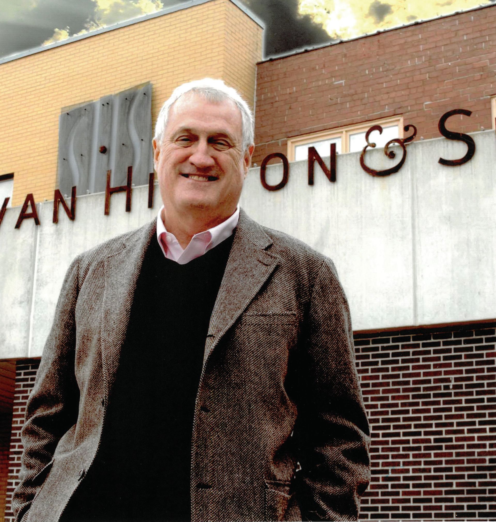 Al Higdon photographed in front of Sullivan Higdon & Sink