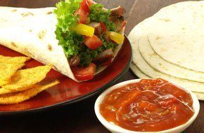 Delicious and healthy mexican dish with tacos and a delicious dip