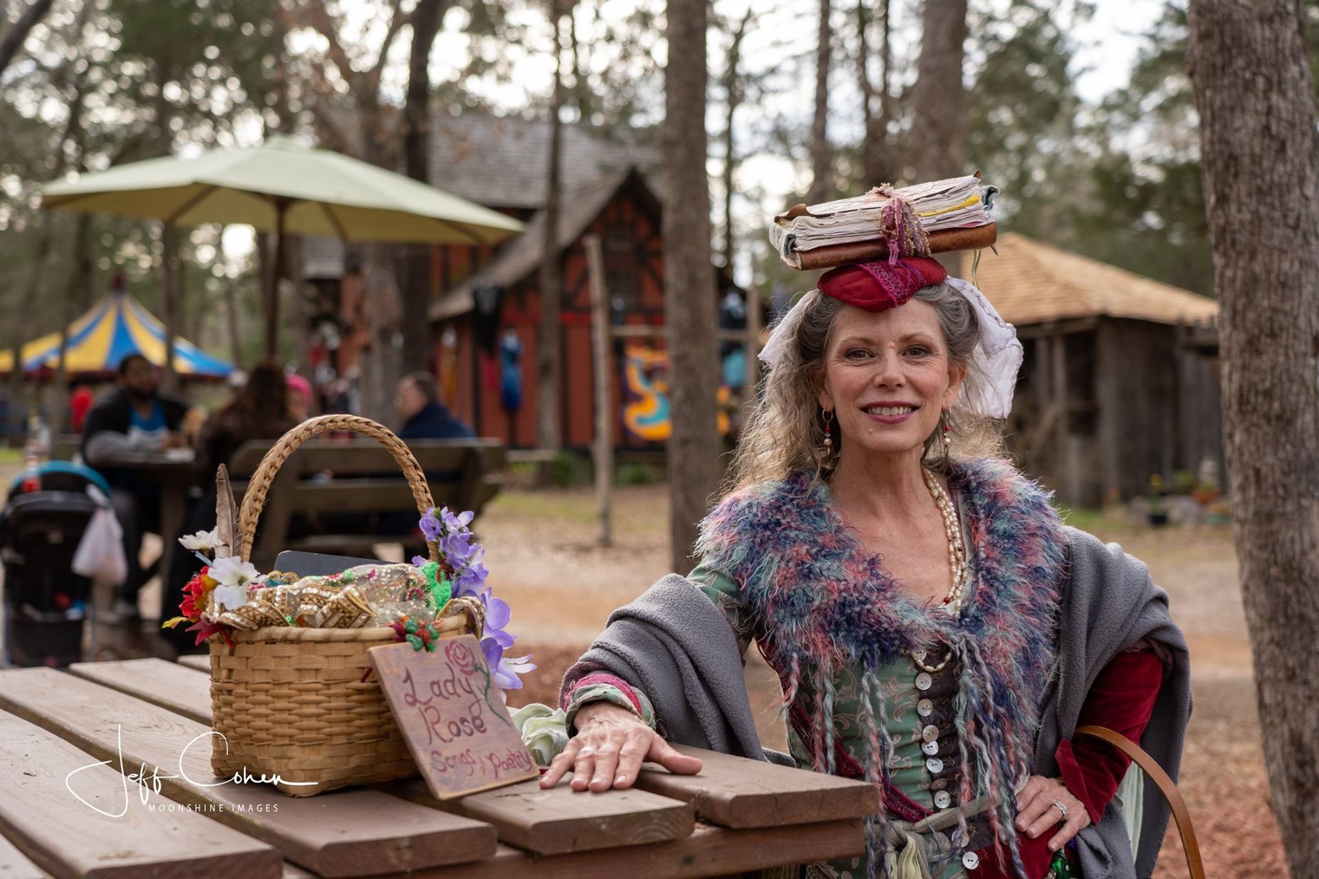 Woman signing books, 