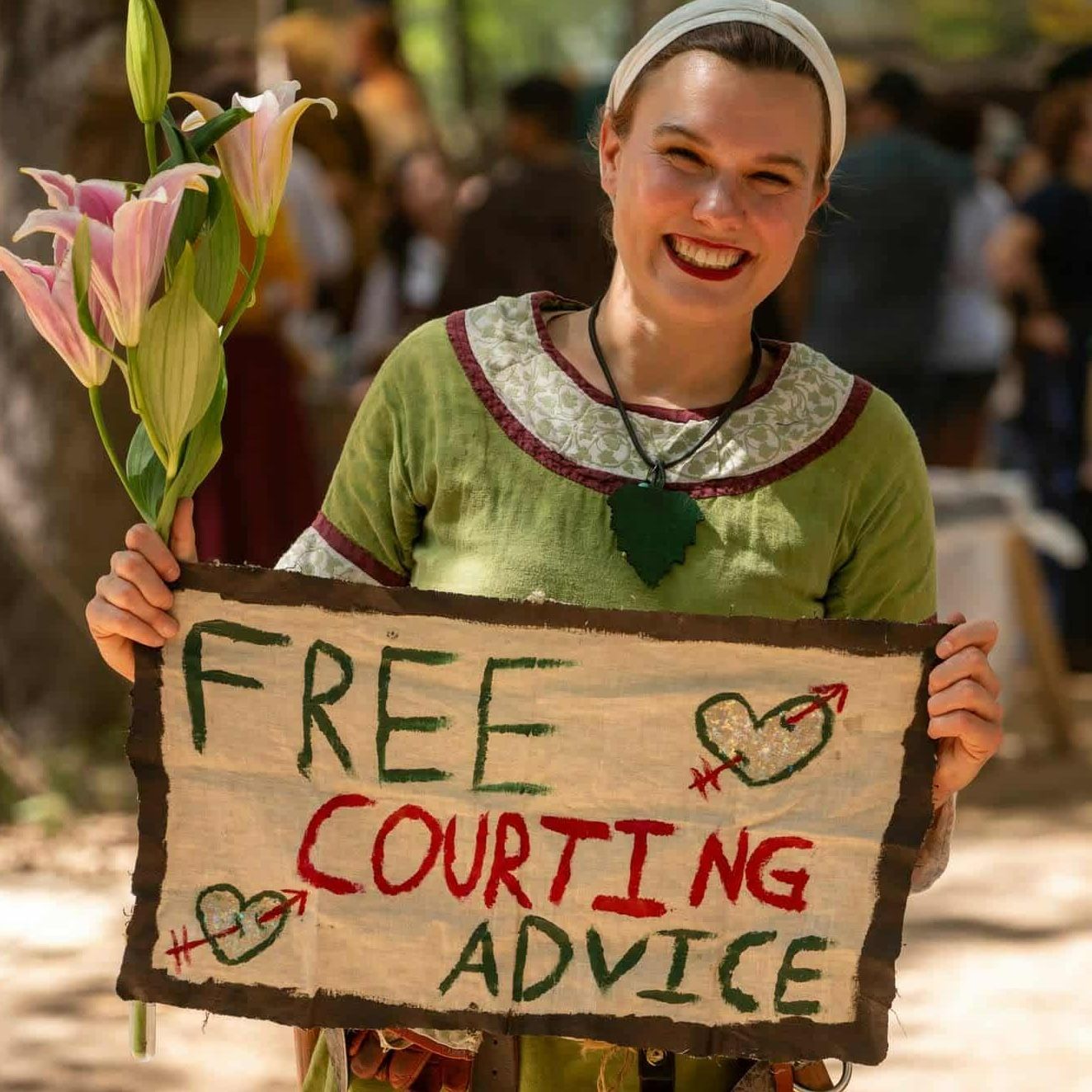 Open book on a wooden surface, pages filled with text.