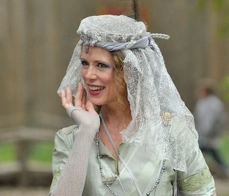 Woman signing books,