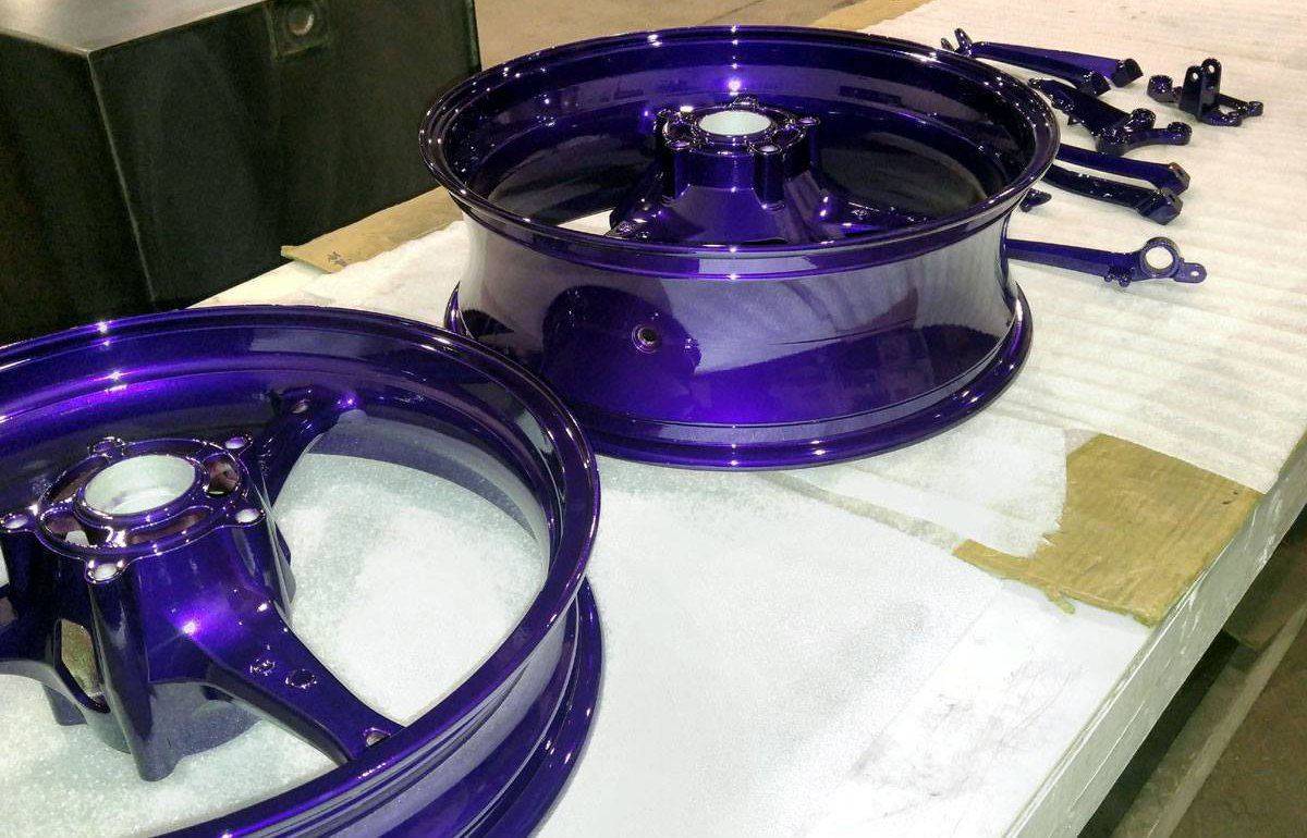 Powder coating for vehicle parts