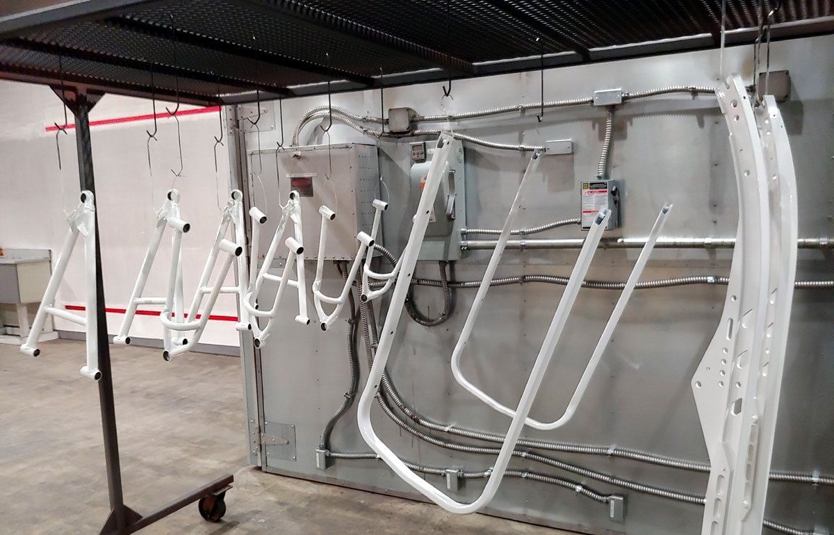 Powder coating for vehicle parts