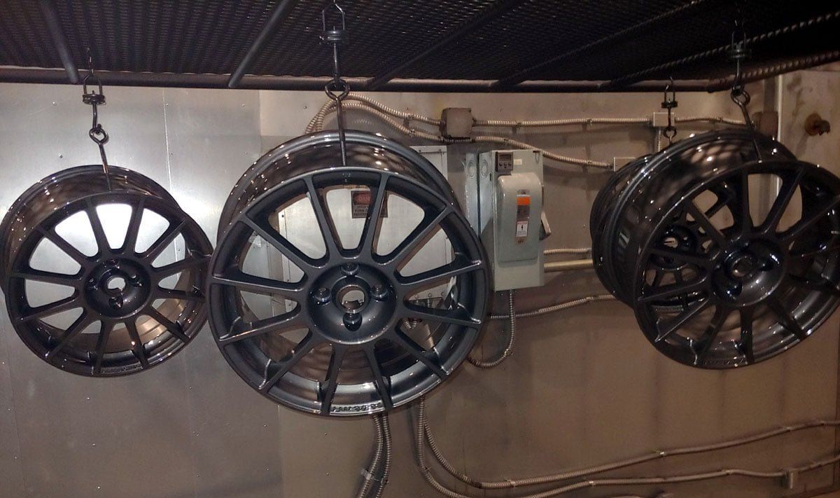 Powder coating for vehicle parts