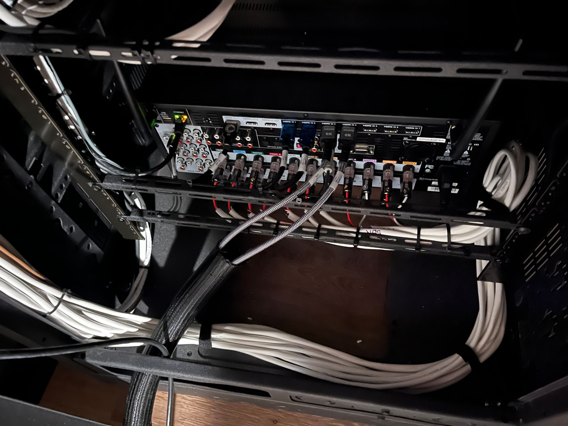 A bunch of wires are coming out of a computer case