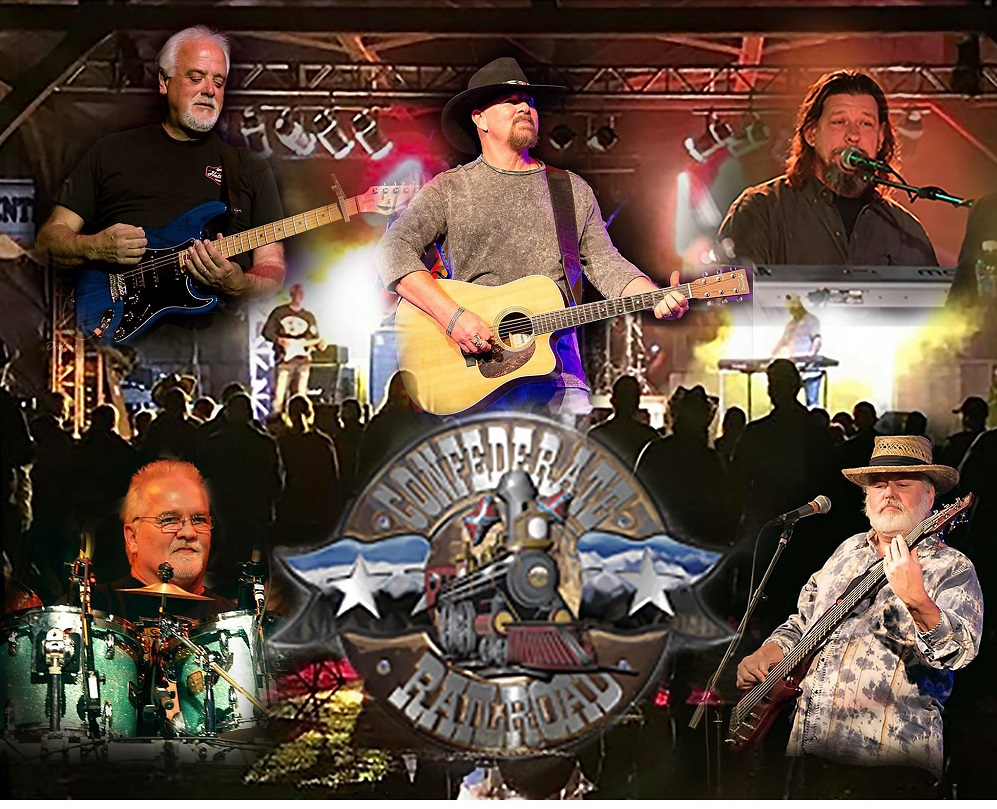 A group of men are playing guitars and singing in front of a crowd.