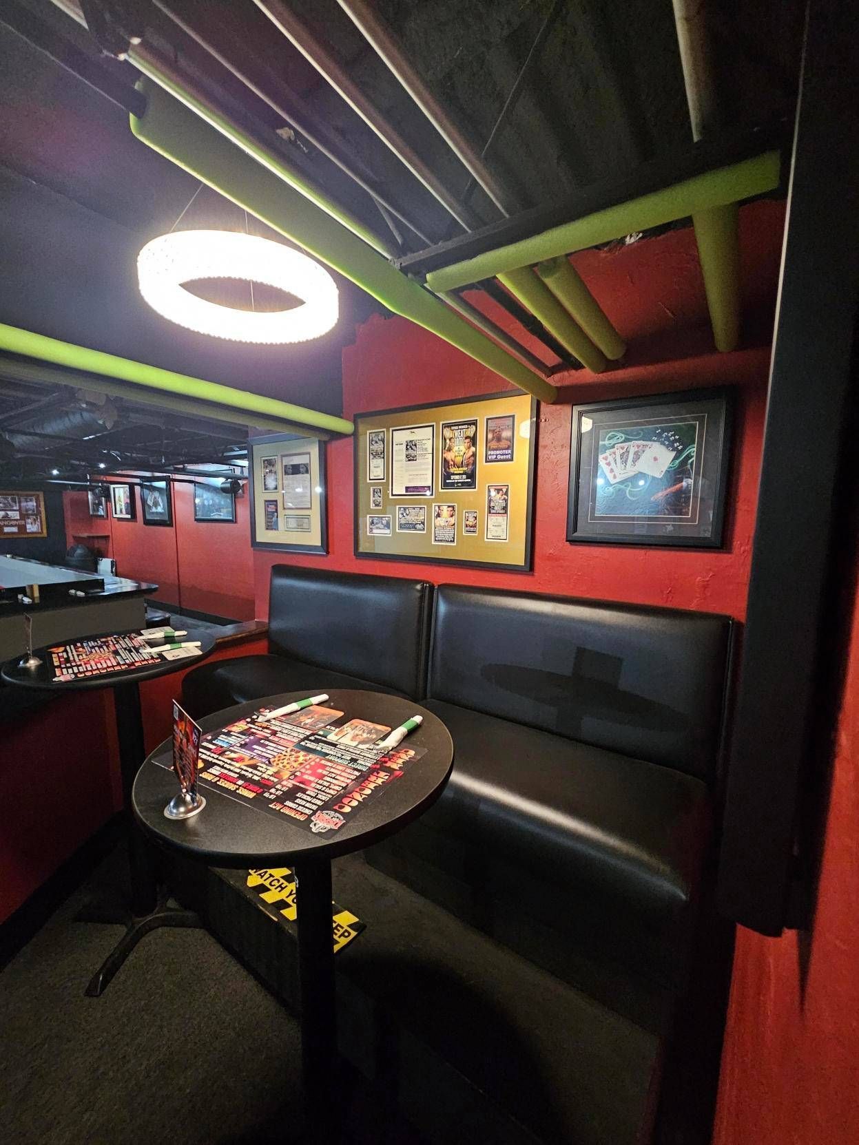 A room with a table and a couch in it