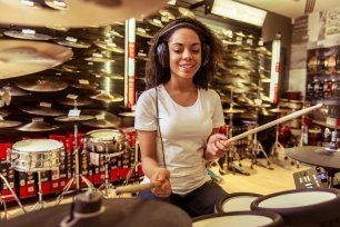 Woman interested with drums