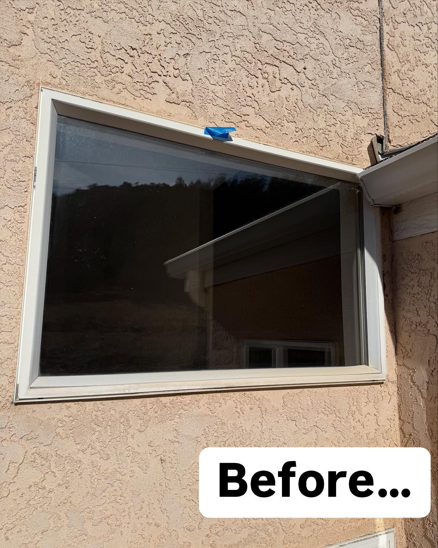 A before picture of a window on a house.