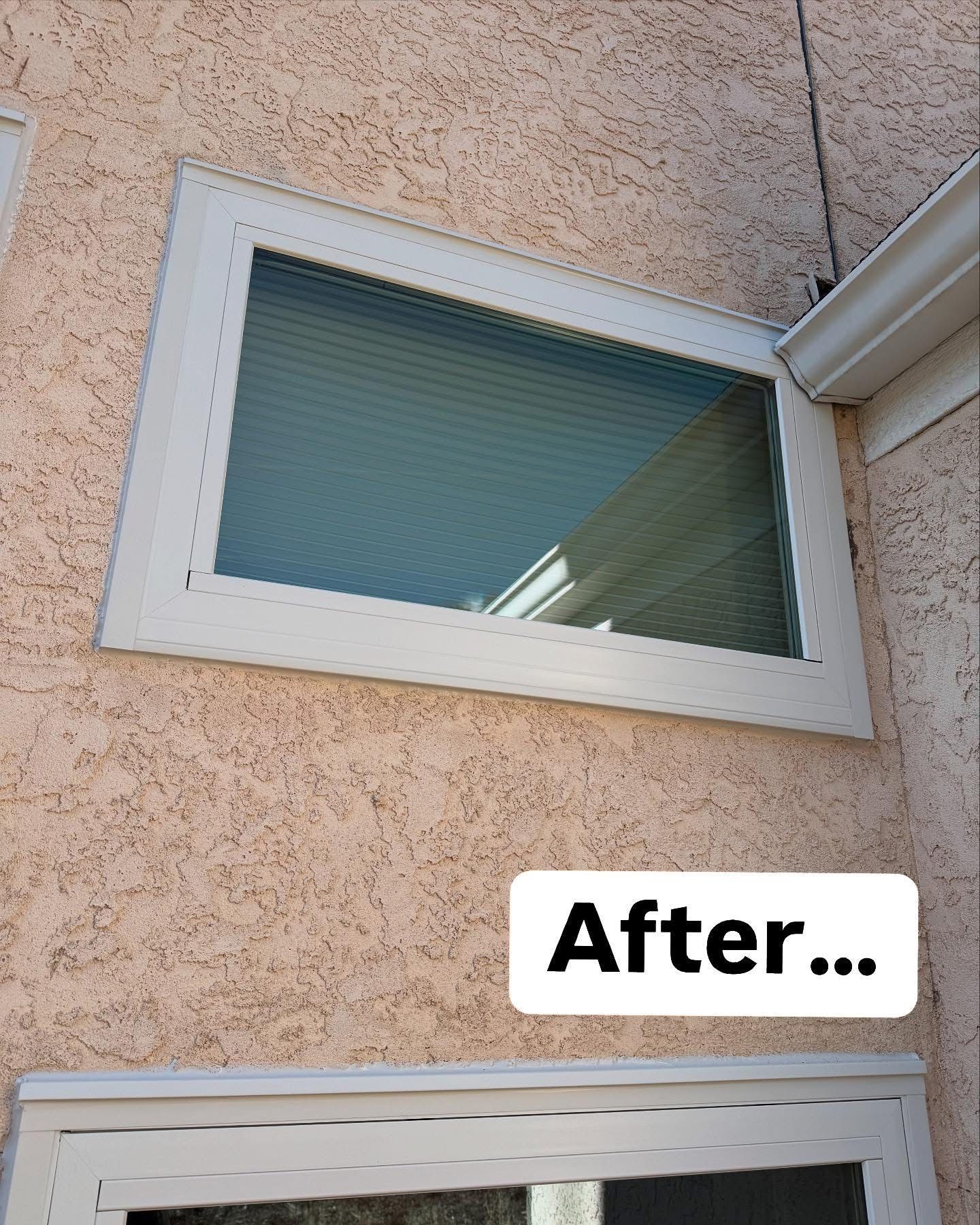 A picture of a window on a building with a sign that says after.