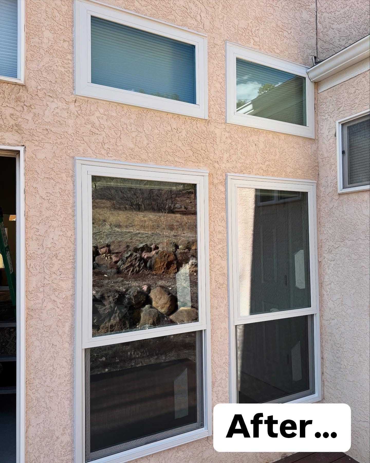 A room with a lot of windows and a sign that says after.