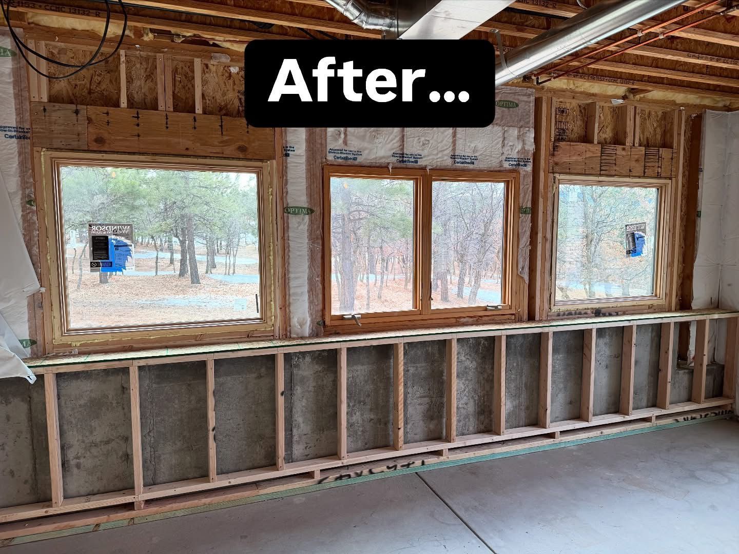 A room with a lot of windows and a sign that says after.