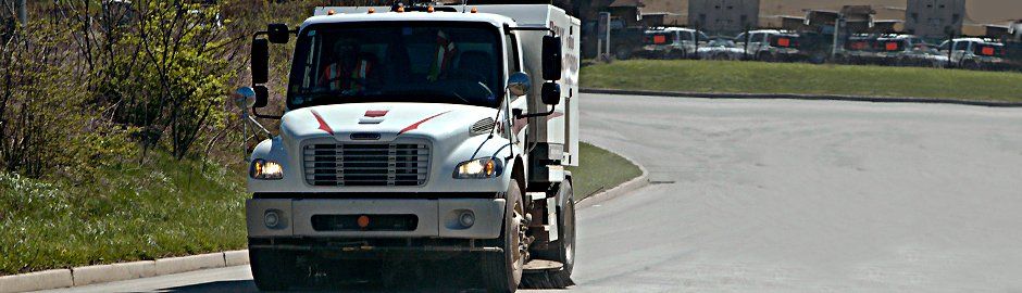 Driveway power sweeping
