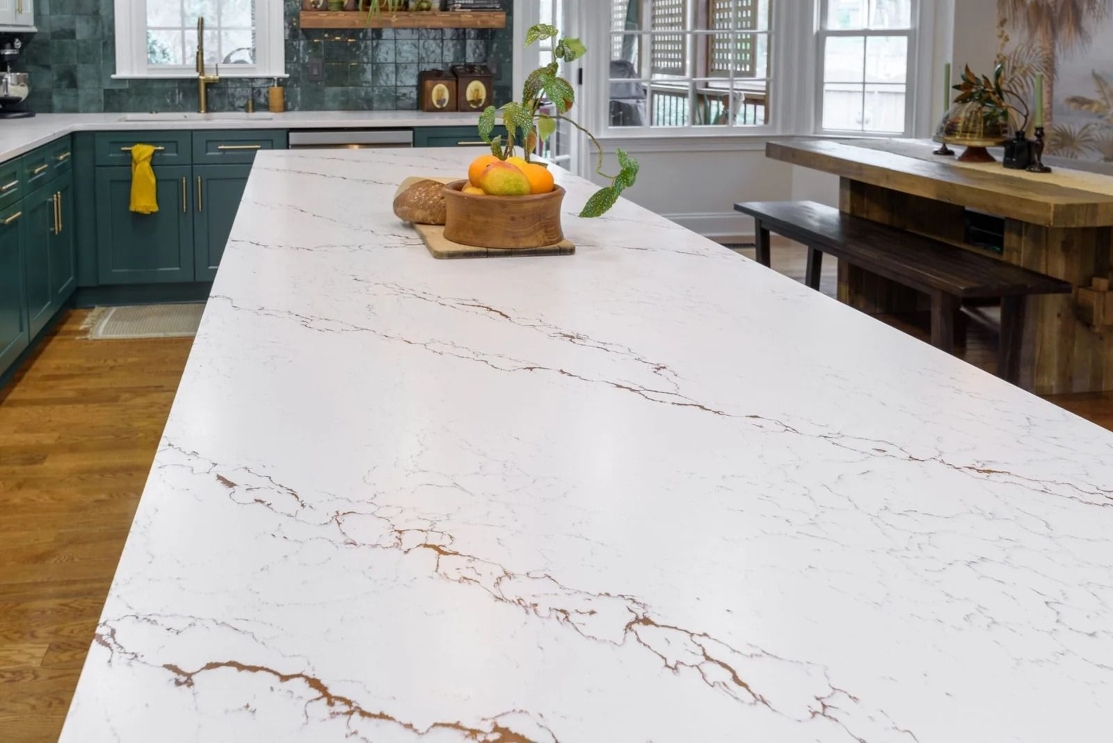 White kitchen countertop with brown veining, in a modern kitchen.