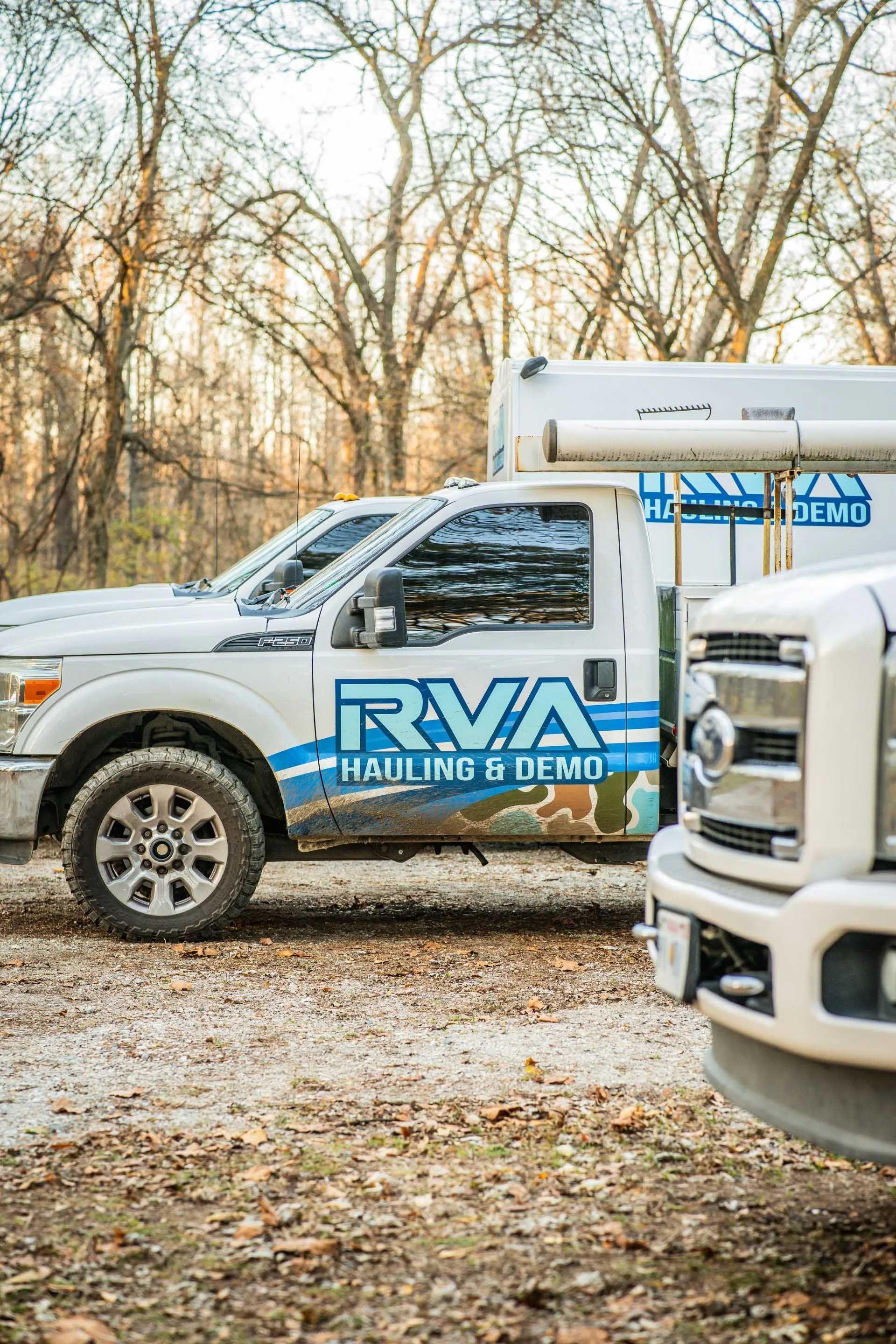 RVA HVAC service truck parked outdoors among bare trees in winter
