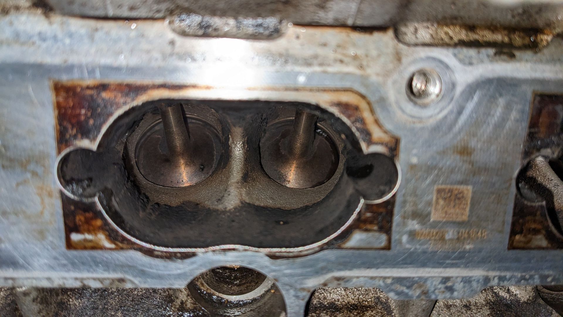 A close up of a metal object with a hole in it.